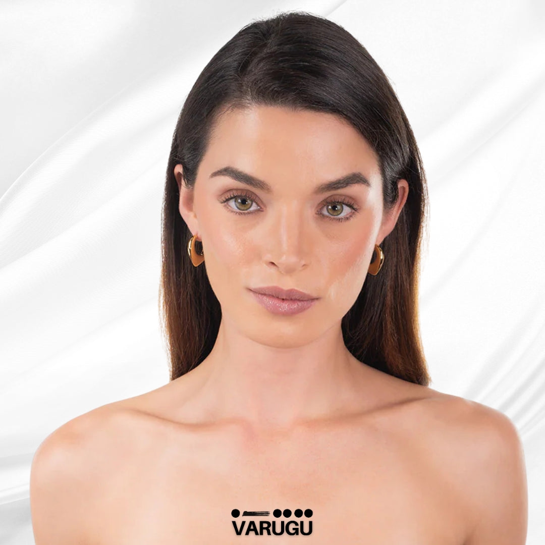 Aretes baño de oro curvos