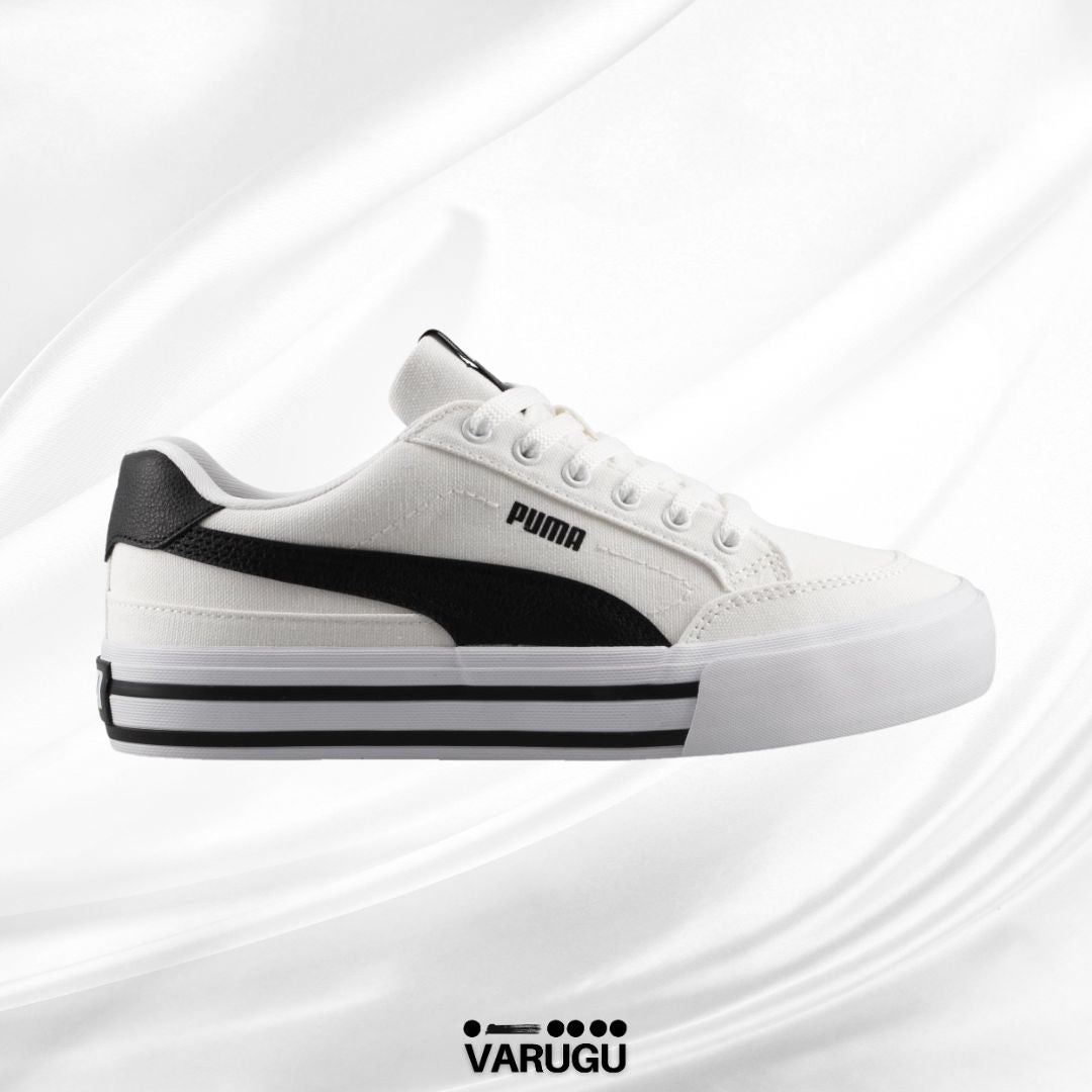 Tenis Puma blancos con franja negra mujer
