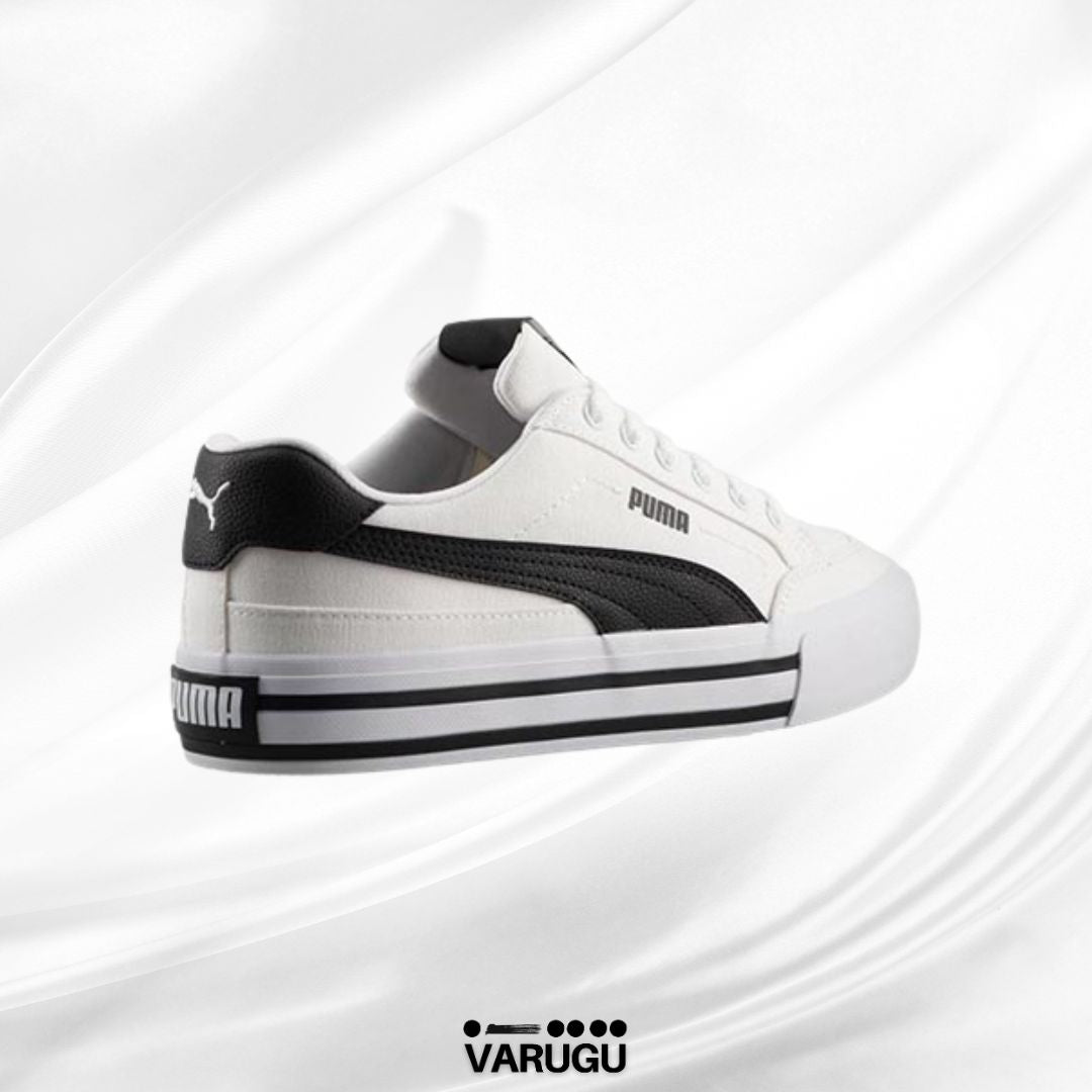 Tenis Puma blancos con franja negra mujer