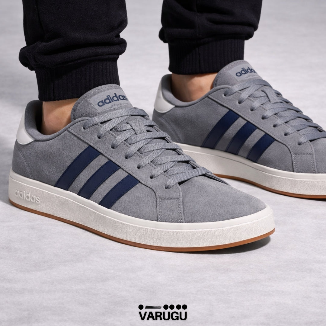 Tenis Adidas grises con franja azul hombres
