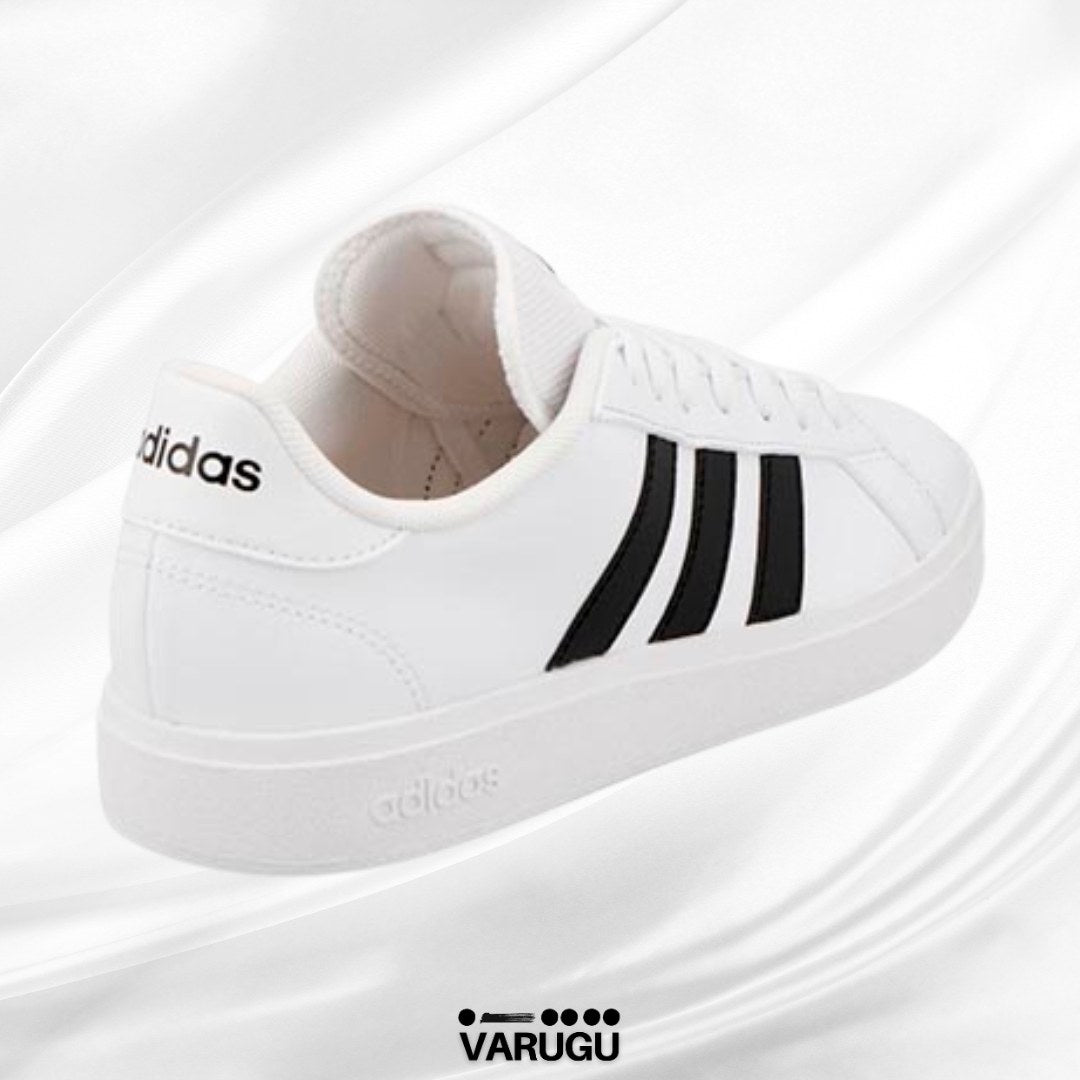 Tenis ADIDAS blancos con franjas negras para dama