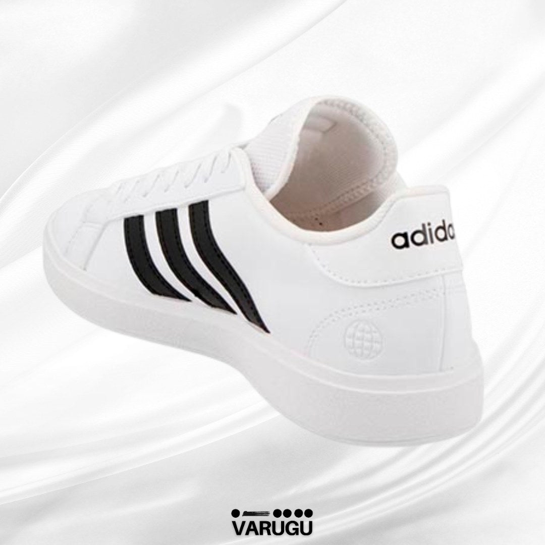 Tenis ADIDAS blancos con franjas negras para dama