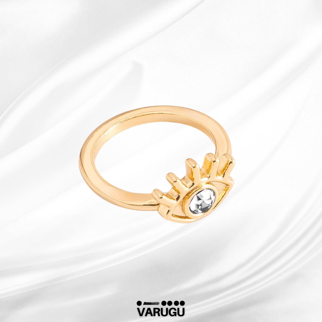 Anillo en baño de oro con diseño de ojo y toque brillante