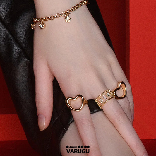 Anillo ajustable baño de oro diseño calado con piedras