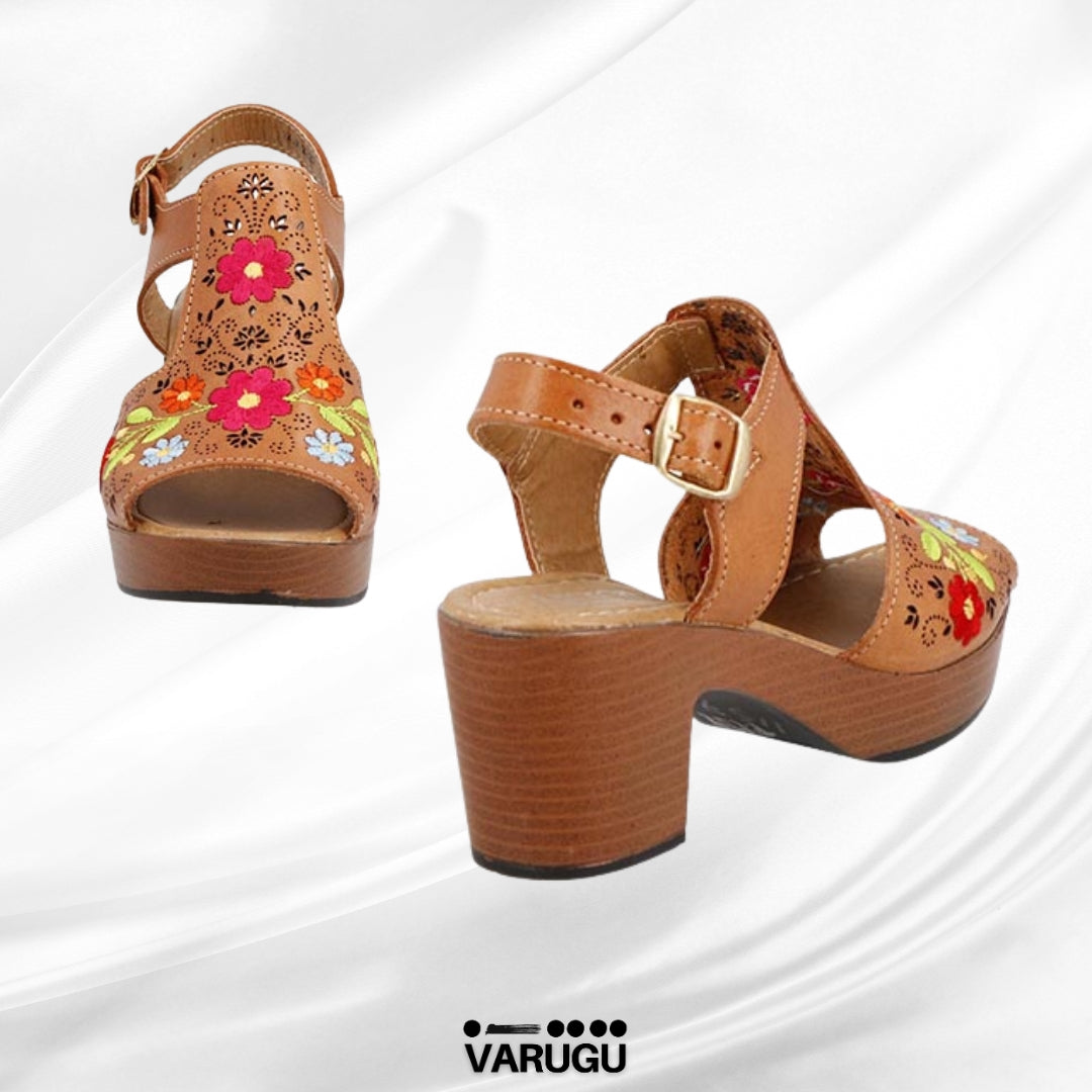 Zapatillas de piel con flores bordadas
