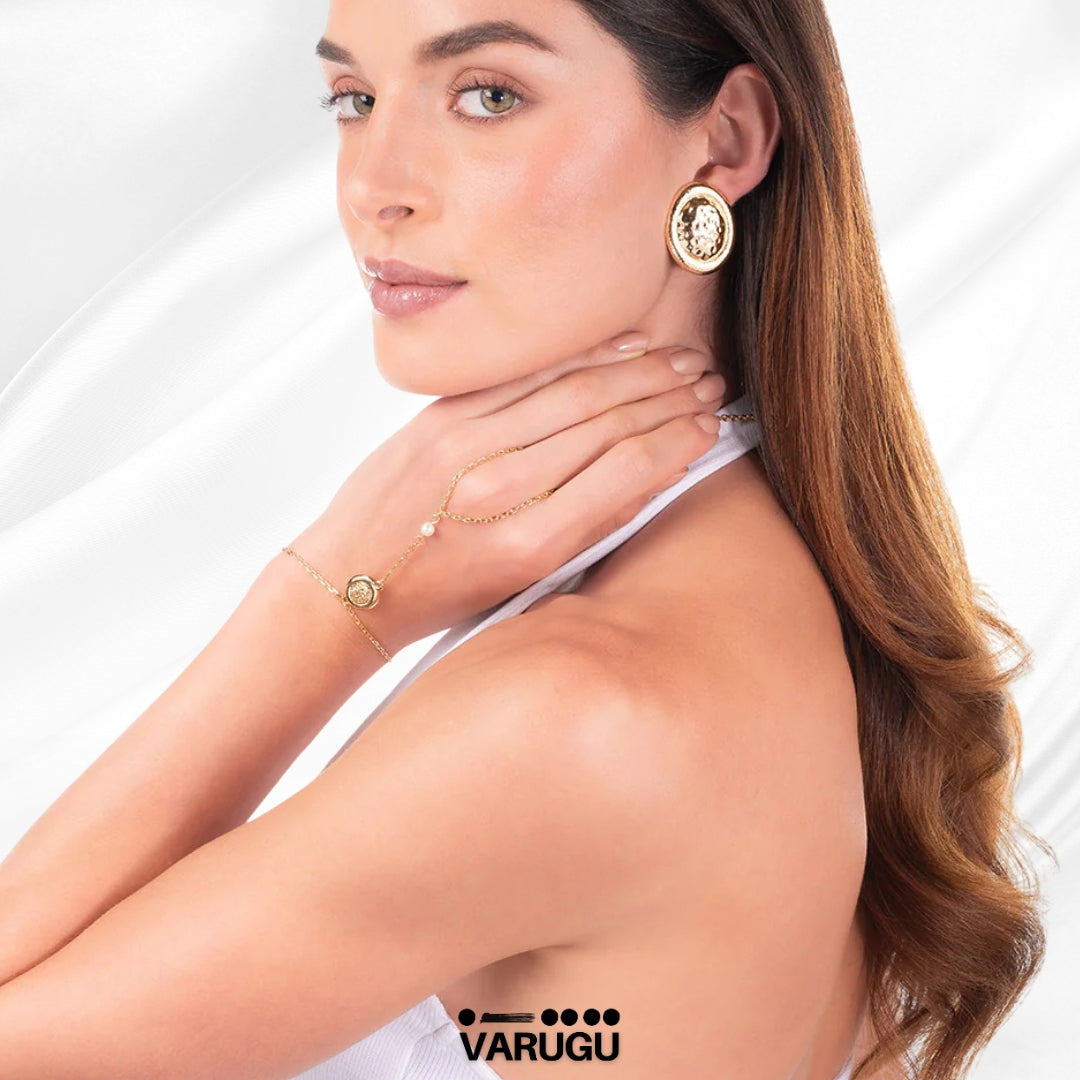 Pulsera baño de oro con diseño de esclava y perla