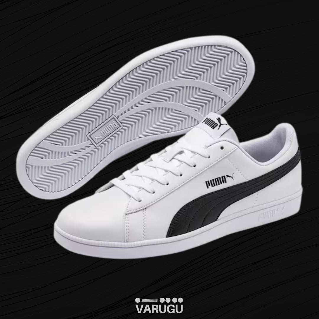 Tenis PUMA con suelas ranuradas color blanco con negro