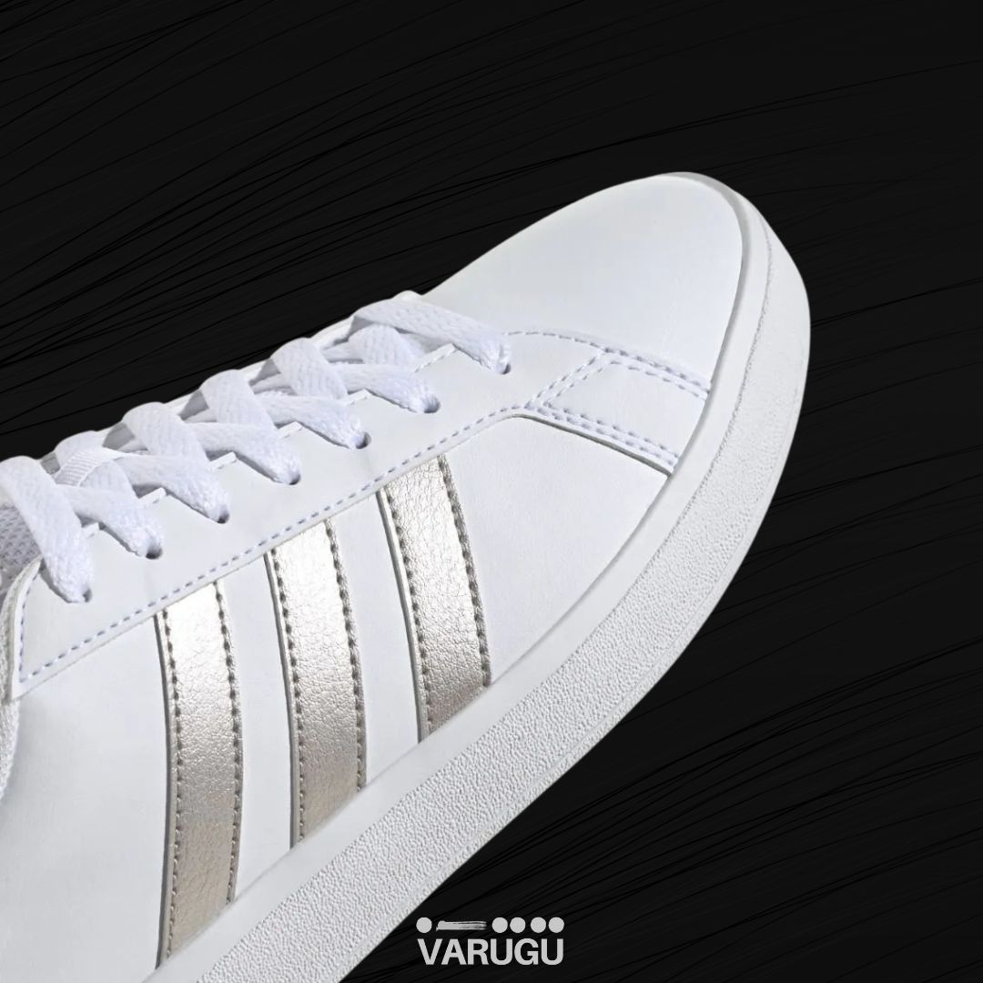 Tenis ADIDAS blancos con franja plata