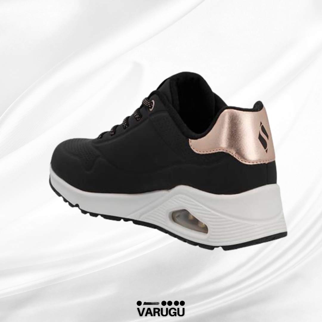 Tenis SKECHERS color negro con suela blanca mujer