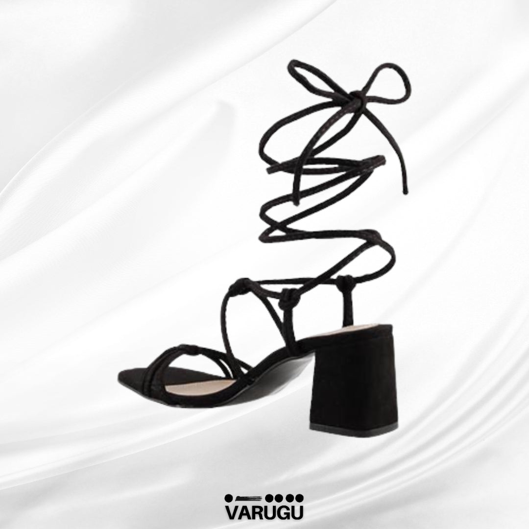Zapatillas negras lujosas para mujer