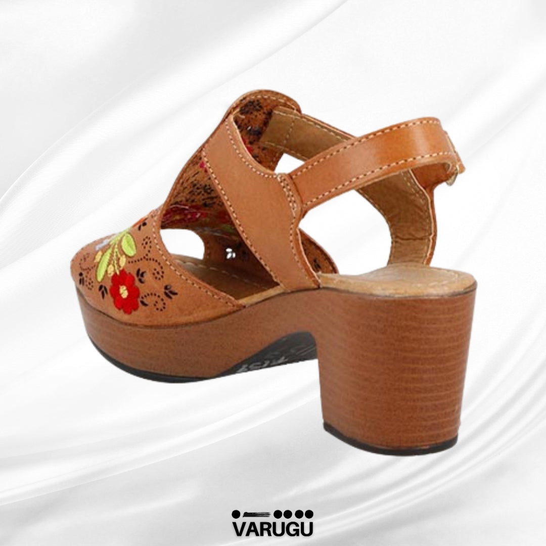 Zapatillas de piel con flores bordadas