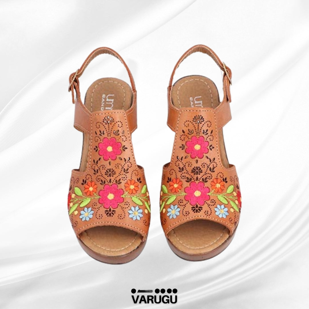 Zapatillas de piel con flores bordadas