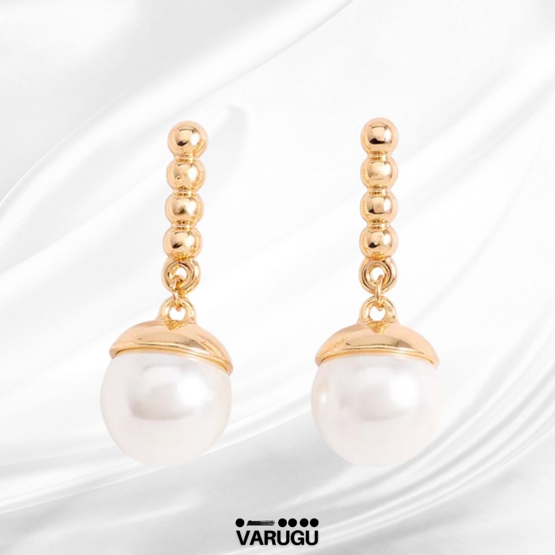Aretes con perla colgante en baño de oro