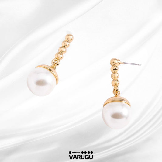 Aretes con perla colgante en baño de oro