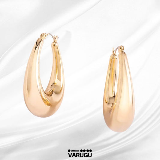 Aretes diseño lágrima en baño de oro