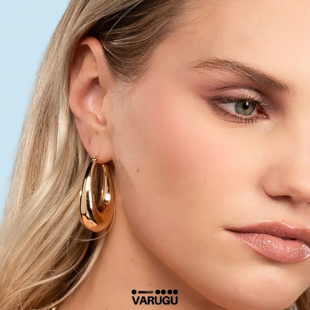 Aretes diseño lágrima en baño de oro