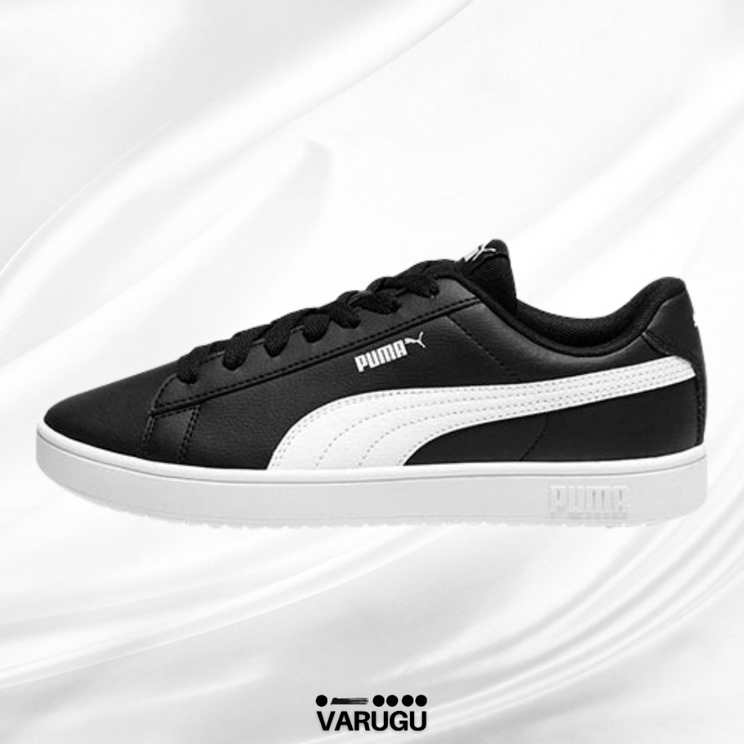 Tenis PUMA color negro con franja mujer