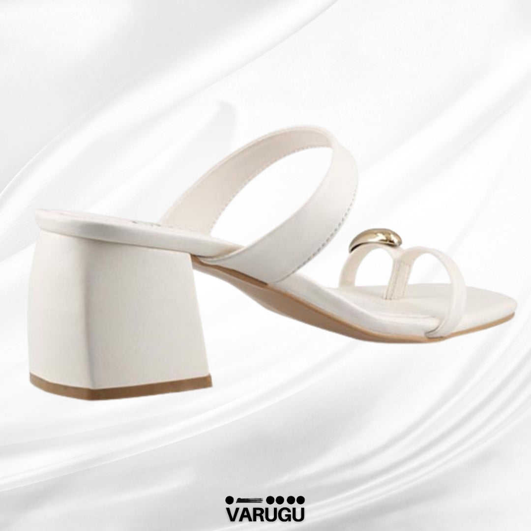 Zapatillas tono leche tacón grueso bajo