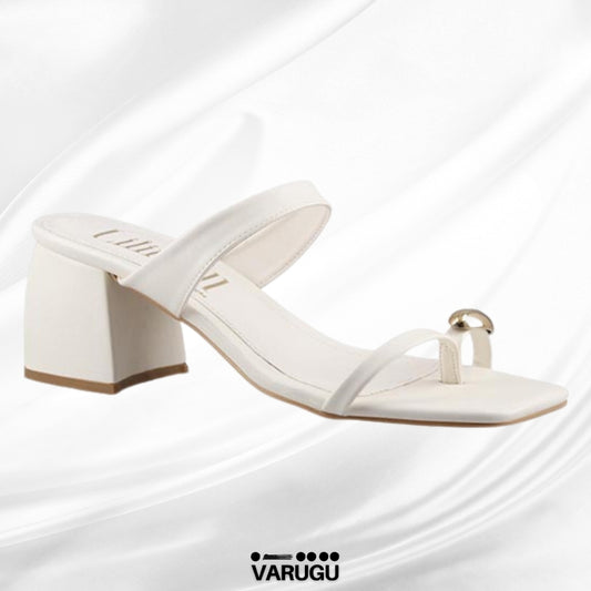 Zapatillas tono leche tacón grueso bajo