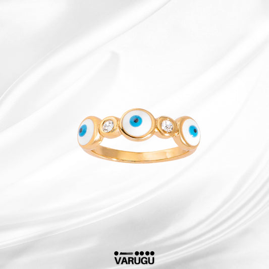 Anillo baño de oro con ojitos y piedras