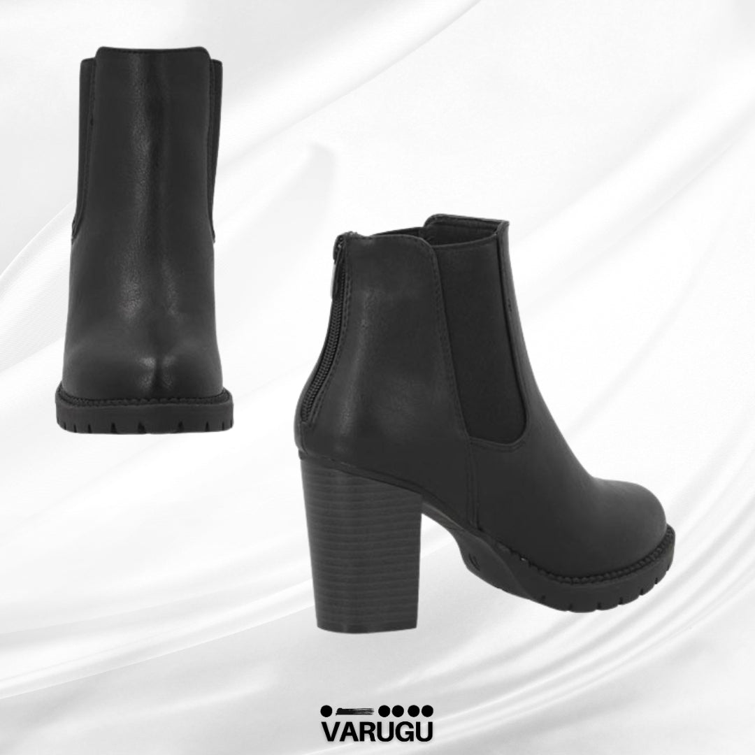 Botas largas negras a la moda con tacón