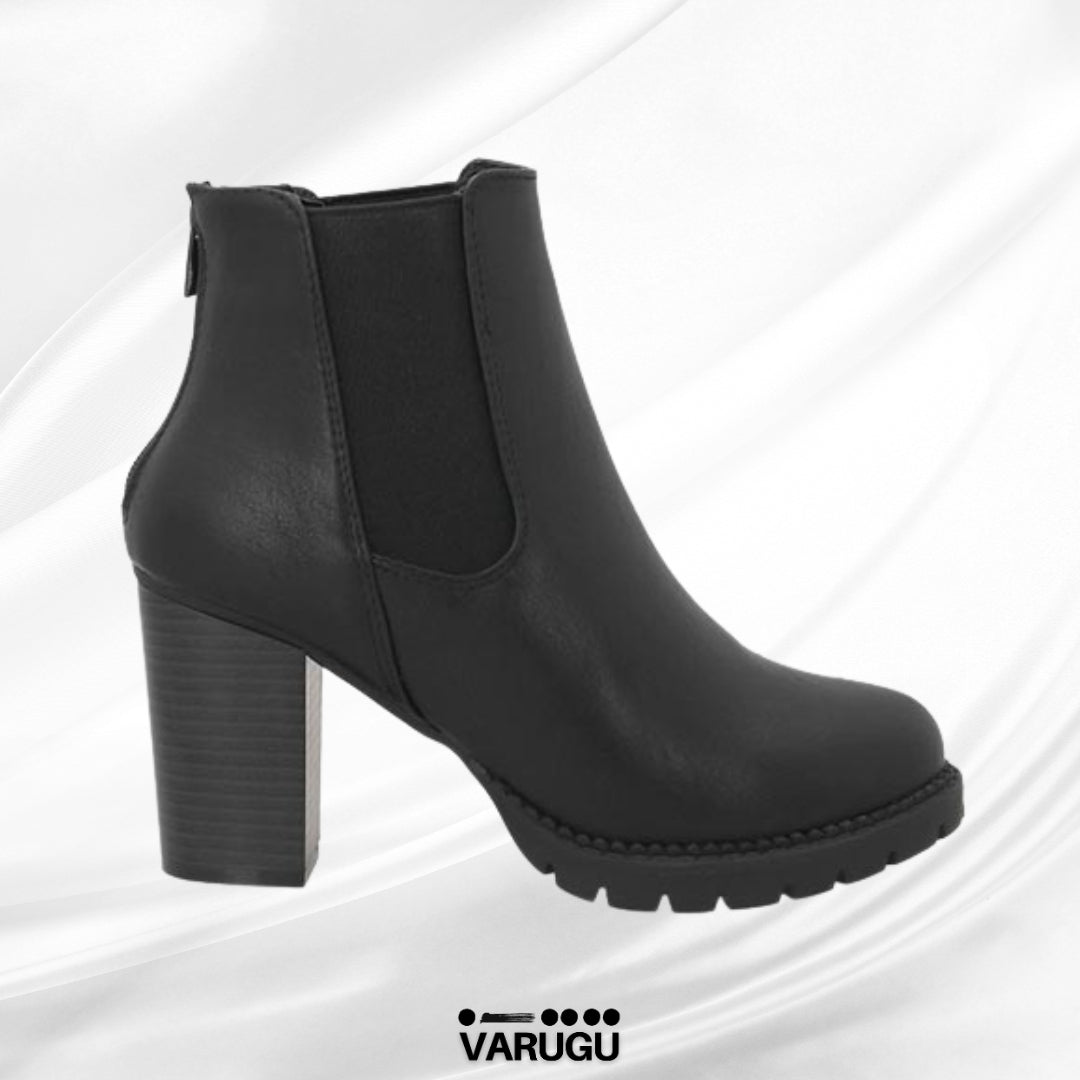 Botas largas negras a la moda con tacón