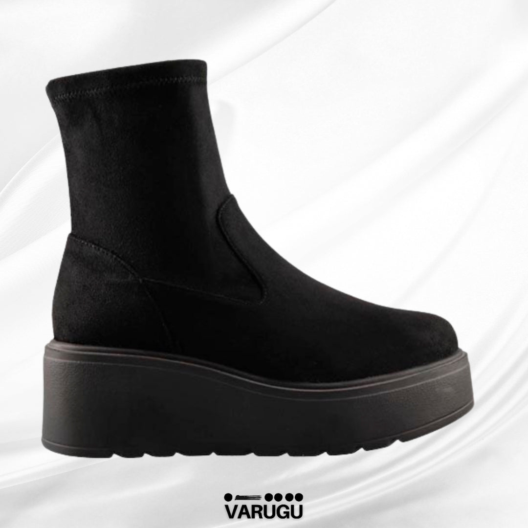 Botas negras con tacón corrido plataforma