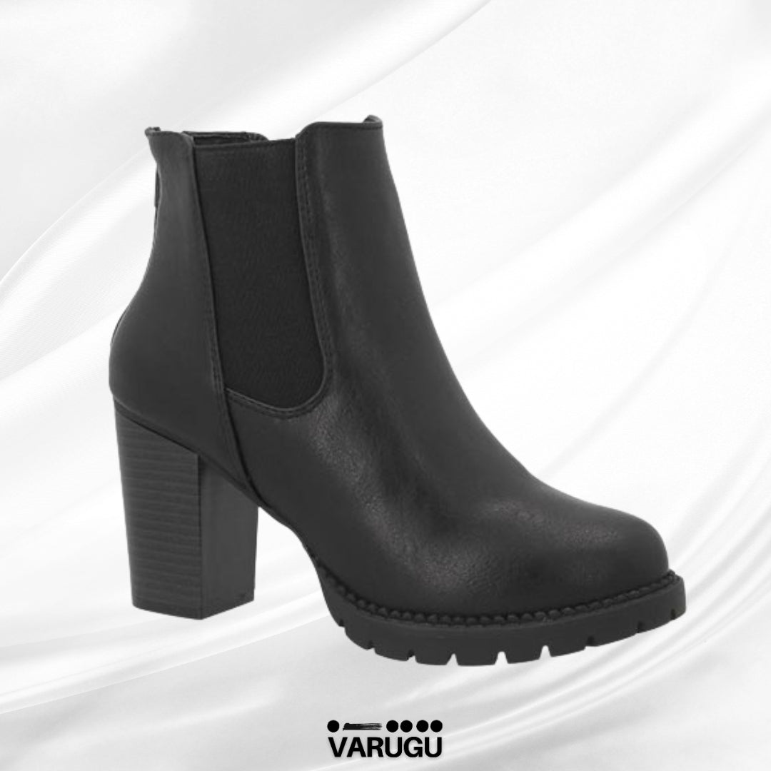 Botas largas negras a la moda con tacón