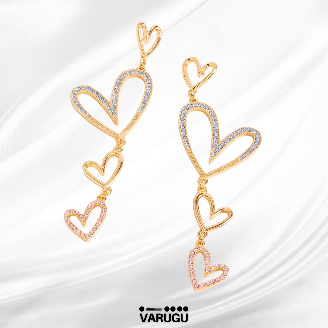 Aretes corazones colgantes en baño de oro