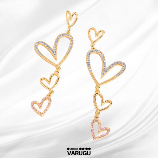 Aretes corazones colgantes en baño de oro