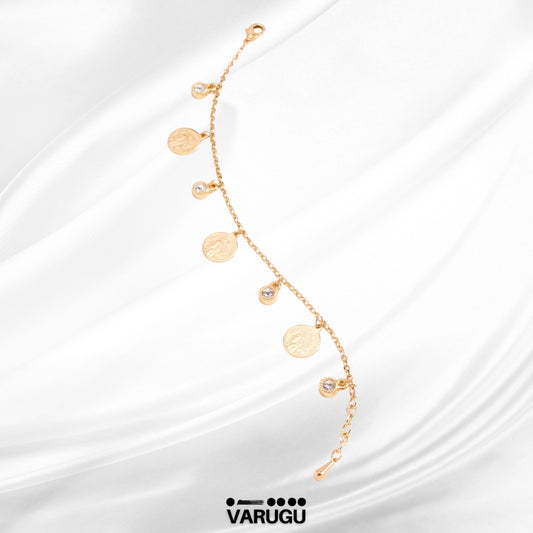Pulsera con dijes de monedas y piedras baño de oro