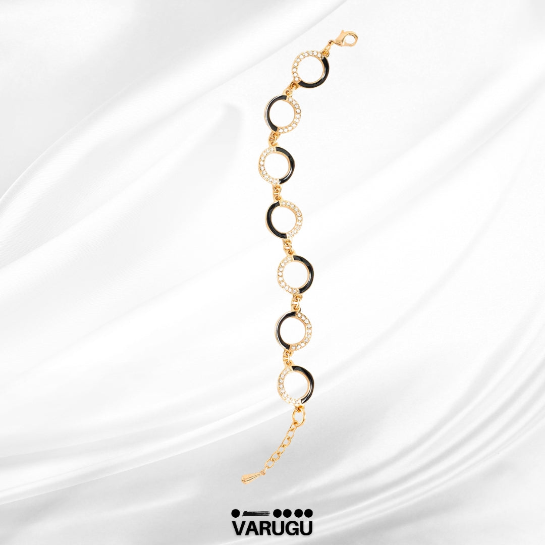 Pulsera baño de oro con esmalte negro y piedras