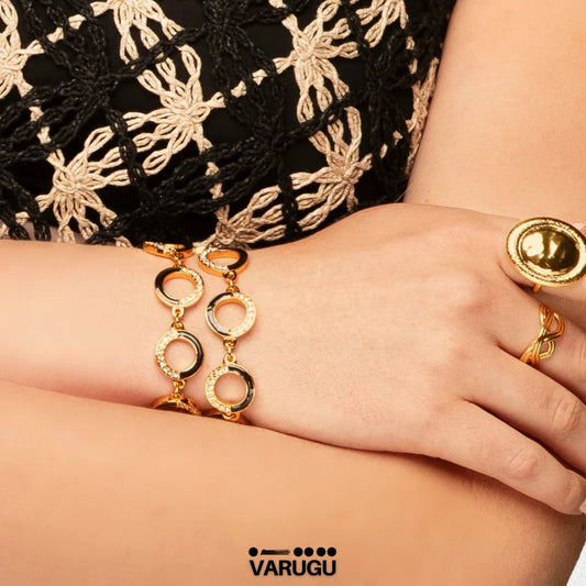 Pulsera baño de oro con esmalte negro y piedras