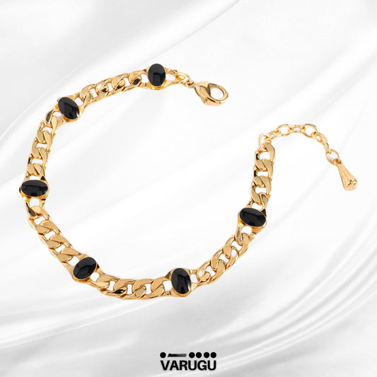Pulsera con cadena y esmalte negro baño de oro