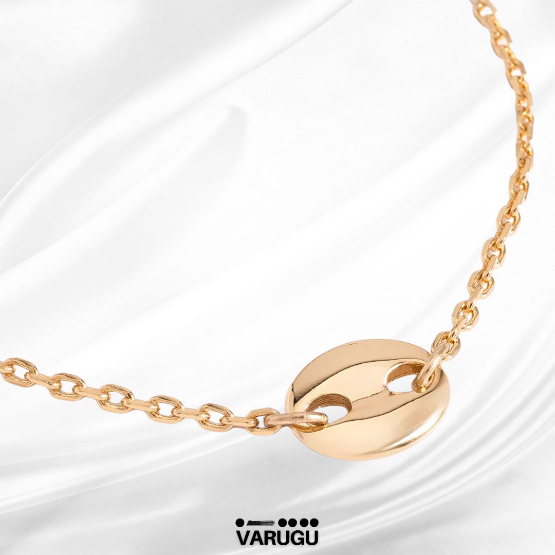Pulsera con medalla circular en baño de oro