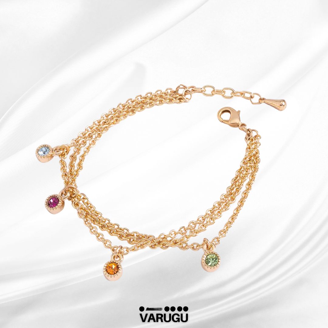 Pulsera con piedras de color en baño de oro