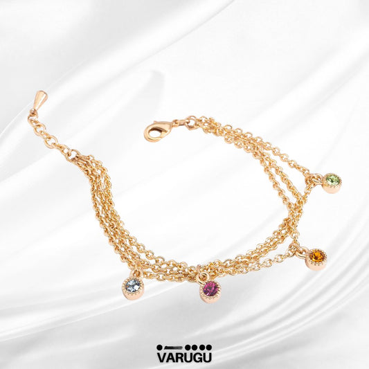 Pulsera con piedras de color en baño de oro