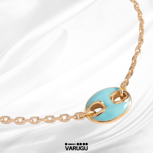 Pulsera medalla con esmalte azul en baño de oro