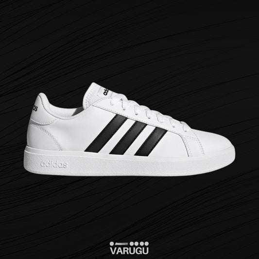 Tenis ADIDAS blancos con franjas negras para dama