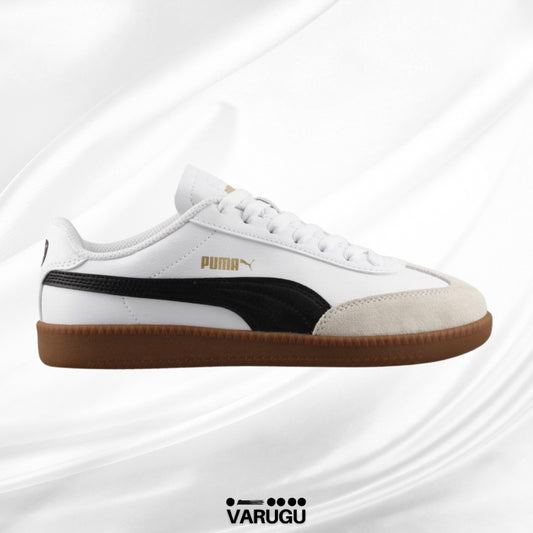 Tenis Puma blancos con franja negra y beige mujer