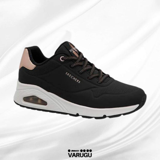 Tenis SKECHERS color negro con suela blanca mujer