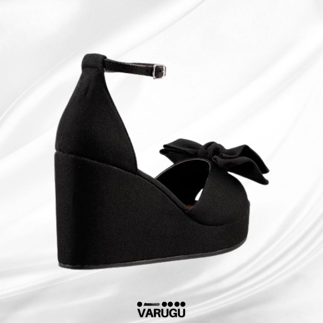Zapatillas altas negras con moño