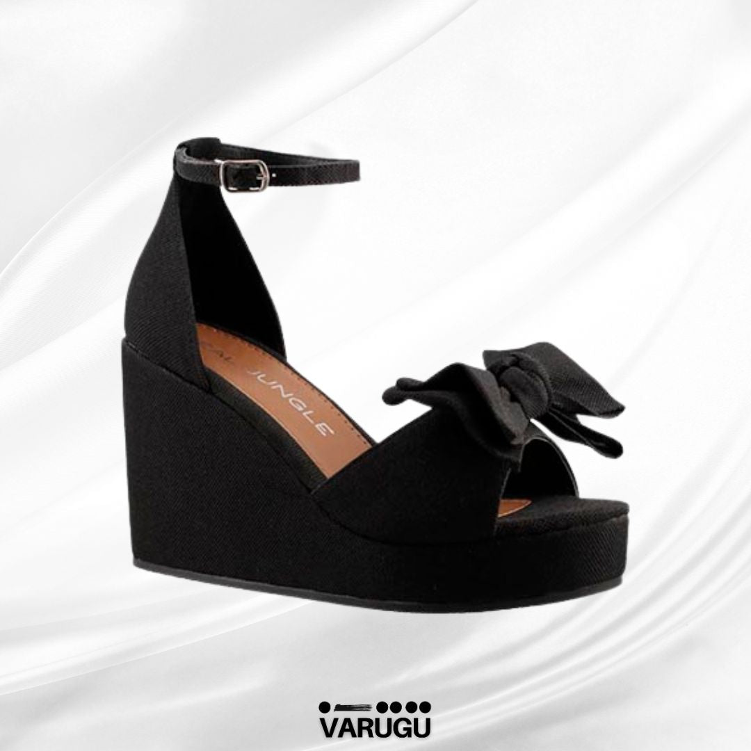 Zapatillas altas negras con moño
