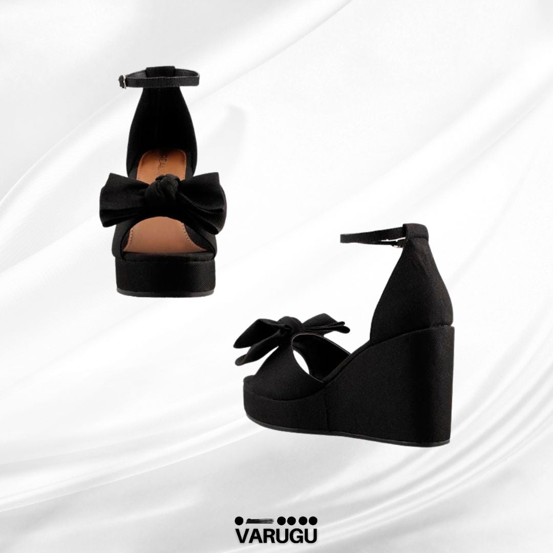 Zapatillas altas negras con moño